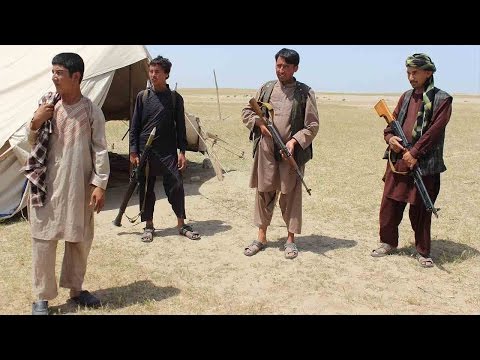 afghan taliban takes district near