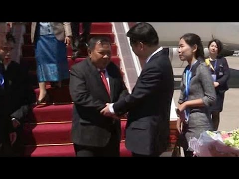 laos president arrives in beijing