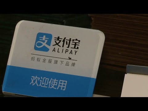 mobile payment firms compete to allow chinese tourists