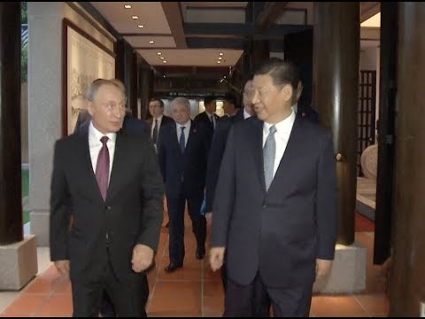 xi putin agree to enhance development