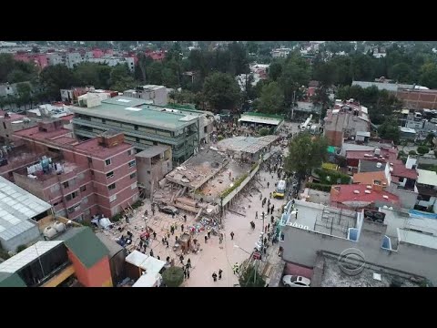 children saved from ruins of collapsed school