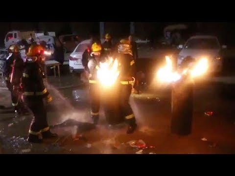 firemen risk lives to put out blazing gas