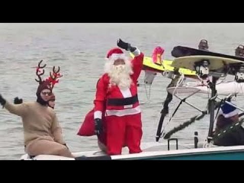 santa and the grinch waterski down the potomac river