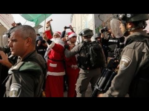 protests put damper on christmas in bethlehem