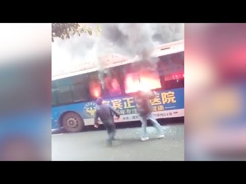 good samaritans rescue people trapped in burning bus