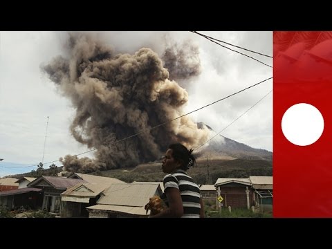 mount sinabung coughs out plumes of volcanic ash indonesia