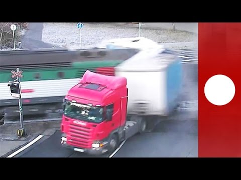 passenger train smashes into truck