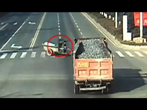 chinese tractor smashed to pieces by truck