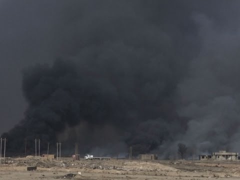 oil wells set ablaze by is forces