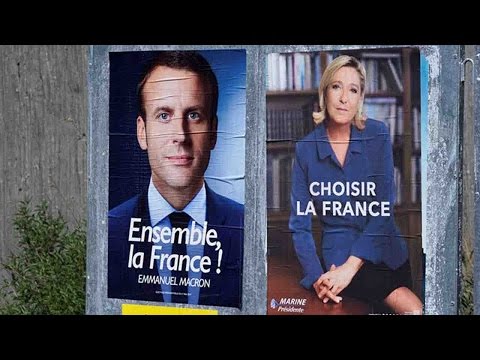 macron slams le pen for exploiting