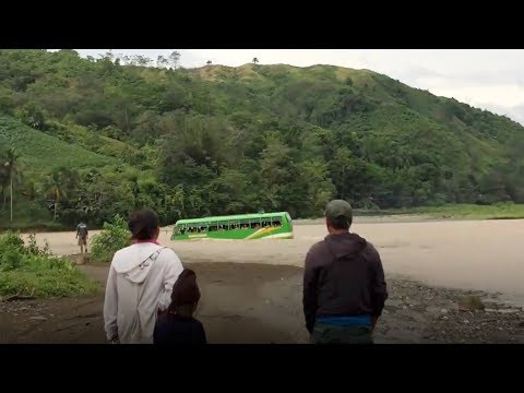 school bus driver takes risky shortcut through flooded