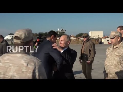 putin meets assad at russian military base in surprise visit to syria