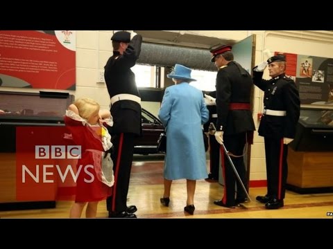 child hit in face by soldier saluting the queen