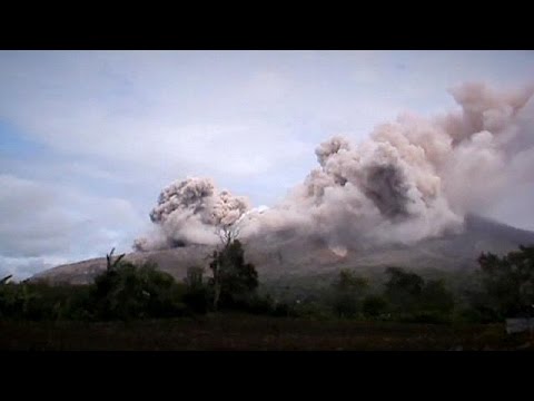 fresh blast from mount sinabung volcano in indonesia