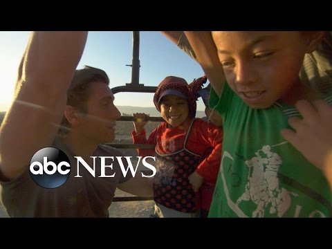 child refugees are working in the fields picking crops