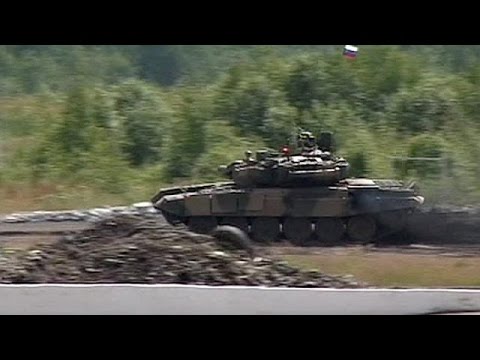 reports of russian tanks and artillery in syria